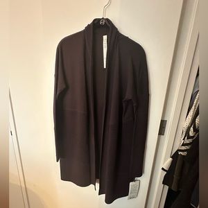 New with tags Lululemon Sit in Lotus Wrap II, Heather Ed plum, size 6